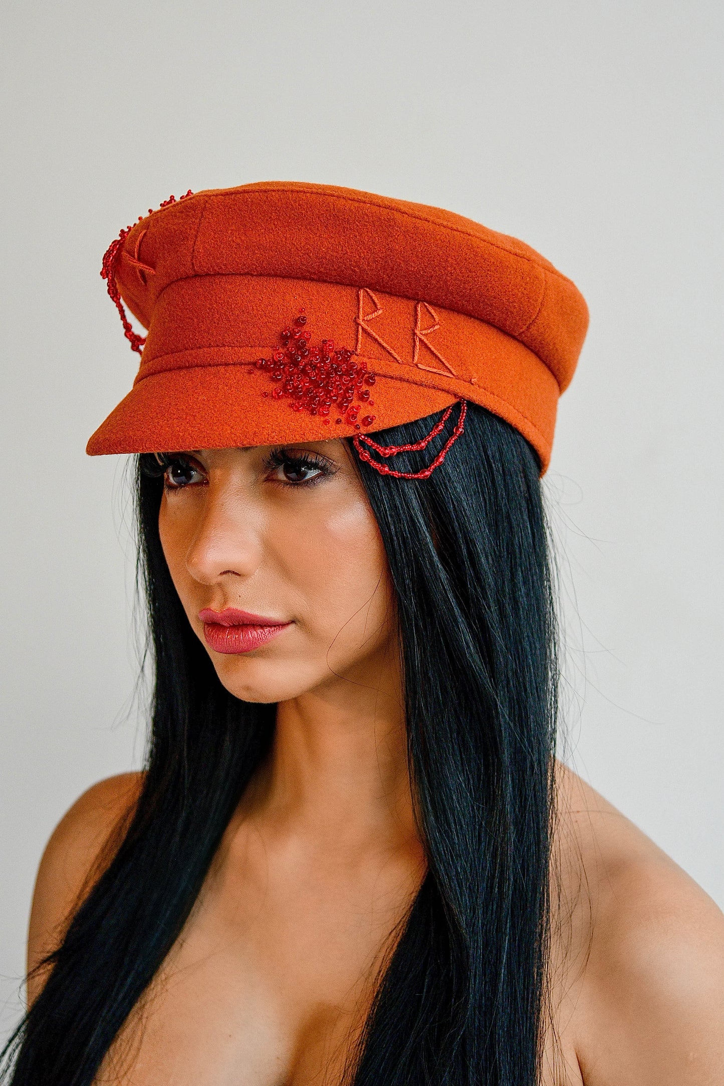 Ruslan Baginskiy orange wool hat, perfect for an elevated Parisian style.